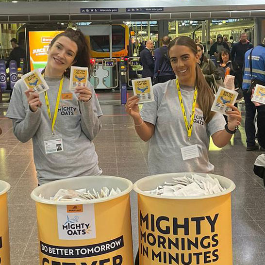 Commuters receiving Mornflake products